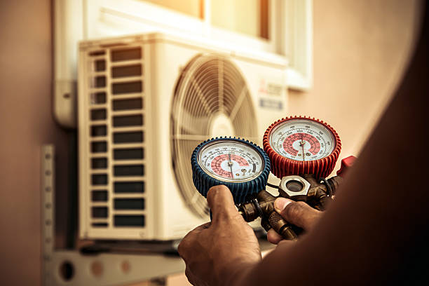 Professional Hvac technician working in Efland, NC